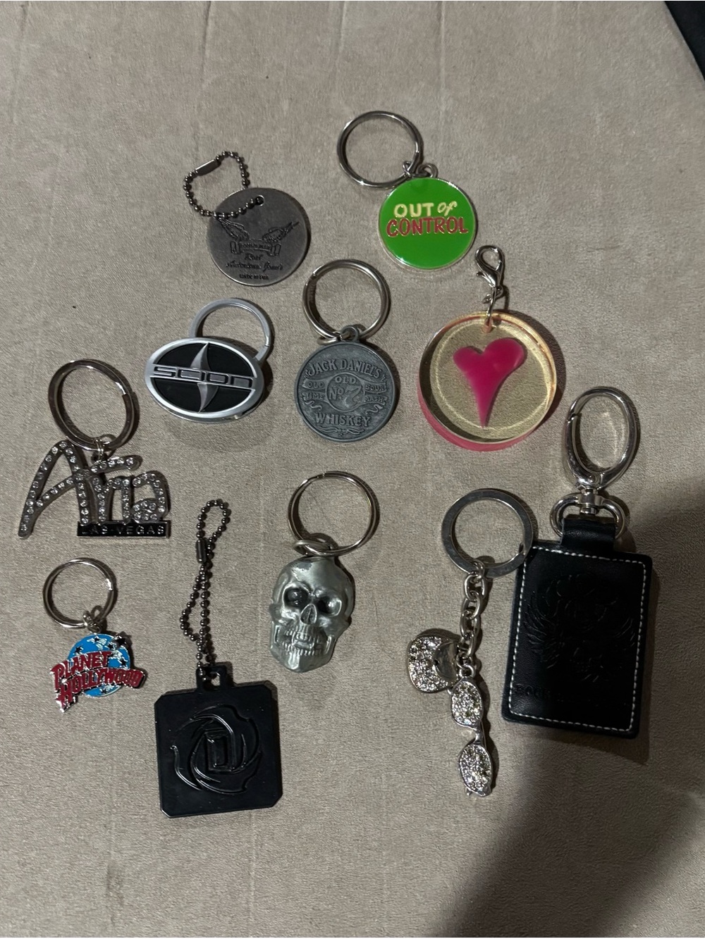 Assorted Keychain Lot with Pink Heart, Skull, and 'Out of Control' Green Tag